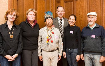 Krista van Velzen and Paulus Jansen with a member of the Brazilian Guarani-Kaiowa community